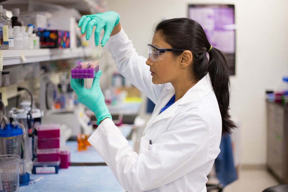 female lab technician working on lab tests